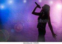 silhouette-of-female-singer-on-stage-e0fk8w.jpg