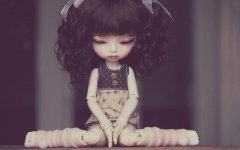 sad-doll-sitting.jpg