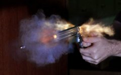 Bullet_coming_from_S&W.jpg