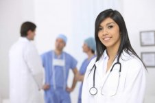 smiling_medical_doctor_with_stethoscope_on_the_hospitals_background_1350367266.jpg